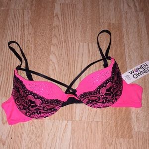 Pink strappy bra with black lace and rhinestones!